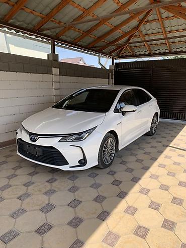 Toyota Corolla: 2022 г., 1.8 л, Автомат, Гибрид, Седан
