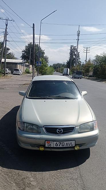 аирбаги: Mazda 626: 2001 г., 2 л, Автомат, Бензин, Седан — 2