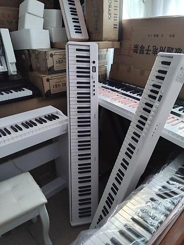 elektron gitara per page 40: Təzədir. Piano kursuna başlayanlar üçün,Piano müəllimləri üçün — 2
