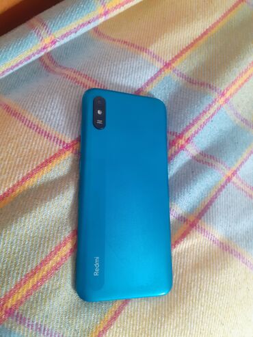 Asus: Redmi 9A, 32 ГБ, цвет - Голубой, Отпечаток пальца, Две SIM карты