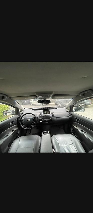 panorama 2008: Toyota Prius (2-ci nəsil, liftback, gümüşü rəng) gündəliy icarəyə — 6