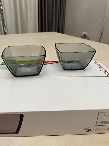 Наборы посуды: Набор для чаепития из фарфора. Состав: - 4 мини-чайника с крышками — 5