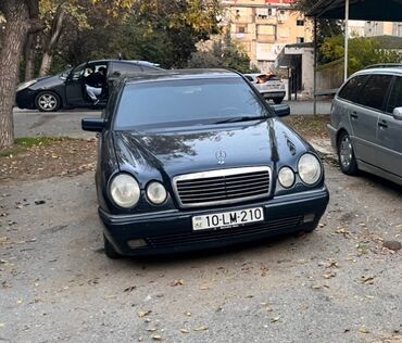 Mercedes-Benz: Mercedes-Benz E 230: 2.3 l | 1996 il Sedan