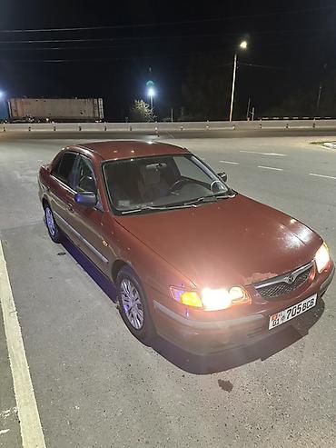 глушитель ауди: Mazda 626: 1998 г., 1.8 л, Механика, Бензин, Седан — 4