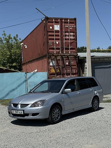 мото 300: Mitsubishi Lancer: 2003 г., 1.6 л, Механика, Газ, Универсал — 1