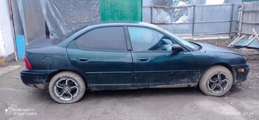 в идеальном состоянии: Продается автомобиль Dodge Neon темно-зеленого цвета. Это седан с