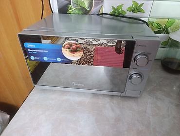 modric ms100: Микроволновая печь Midea

- Объем камеры: 20 л в отличном состоянии — 1