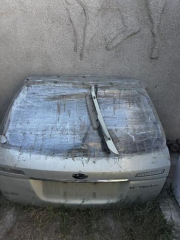 субару аутбек запчасти: Крышка багажника Subaru Outback (надпись OUTBACK на крышке). - Цвет — 1