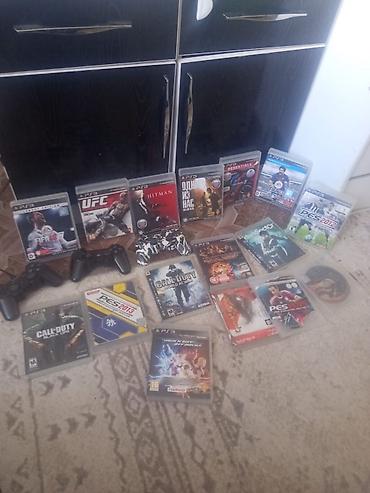 PS3 (Sony PlayStation 3): Игровая консоль Sony PlayStation 3 (модель Slim) с набором дисков — 15