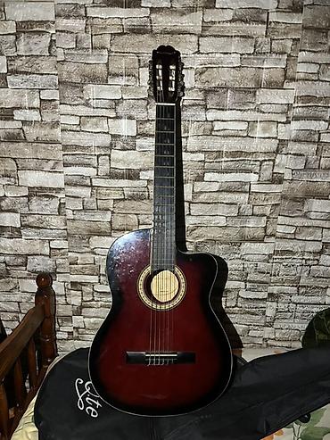 gitara qiymətləri: 200 manata alinib demek olar ki yenidir. Yeni simler ve çantası — 2