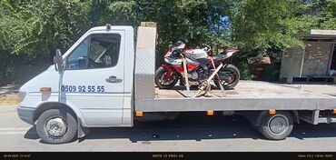 Услуги эвакуатора: С ломаной платформой, С частичной погрузкой, С прямой платформой — 10