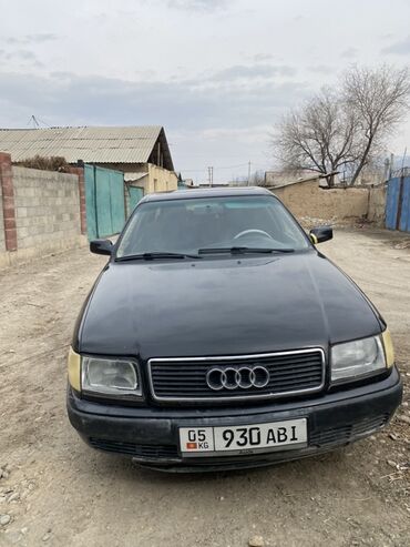 Транспорт: Продается Audi 100 черного цвета. Это классический седан с