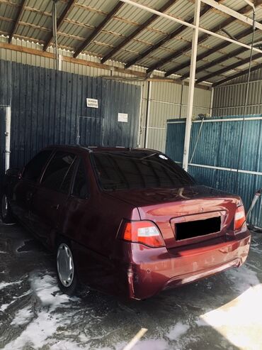 шины 14 нексия: Седан Daewoo Nexia (рестайлинг) бордового цвета. Основные