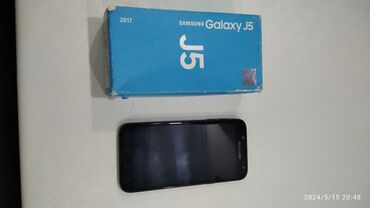 telefo: Samsung Galaxy J5, 16 GB, rəng - Qara, Sensor, Barmaq izi, İki sim kartlı