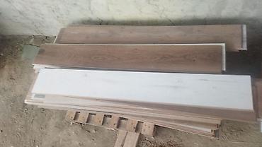 Laminat döşəmə taxtaları - Taxta fakturalı laminat lövhələr dəsti -