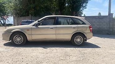 рекистон пикап: Mazda 323: 2001 г., 1.6 л, Автомат, Бензин, Универсал — 4