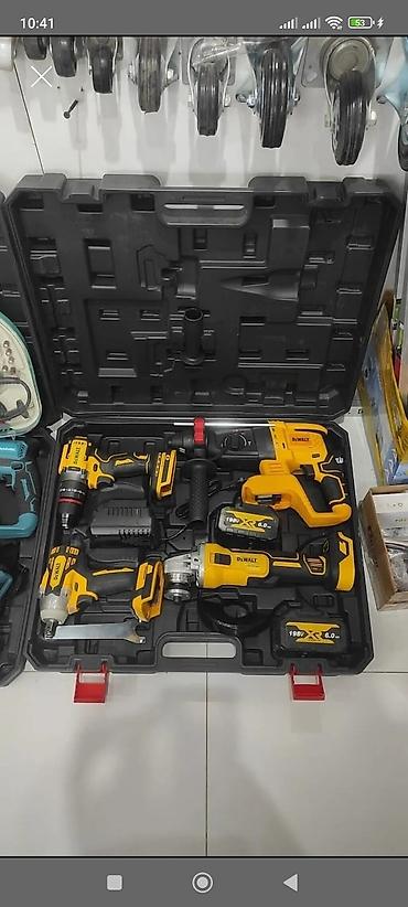 drel dəsti: Dewalt simsiz alətlər dəsti – böyük daşıma çamadanında Tərkib: - — 1