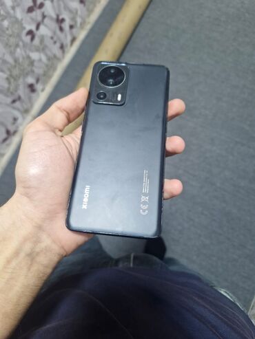 samsung a10 islenmis: Xiaomi 13 Lite, 256 ГБ, цвет - Черный, 
 Кнопочный, Сенсорный, Отпечаток пальца