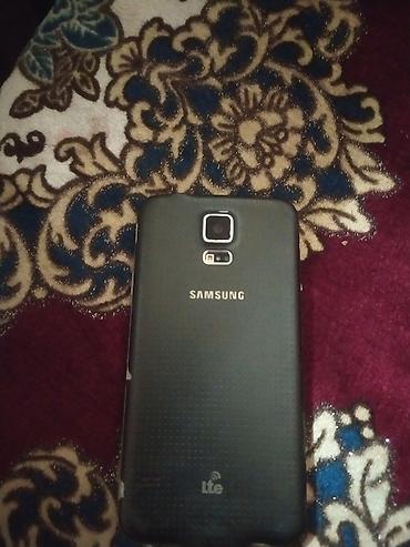 Уюлдук телефондор: Samsung Galaxy S5, Колдонулган, 32 ГБ, түсү - Кара — 1