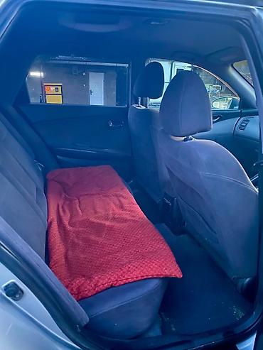 Nissan Primera: 2002 г., 2 л, Вариатор, Бензин, Универсал — 9