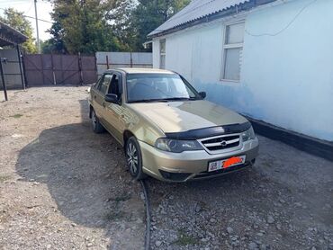 на матиз шины: Chevrolet Nexia (седан, 4 двери), цвет золотистый/бежевый. Кузов и
