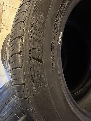 Şin və təkərlər: 225/55 R16 ölçülü avtomobil şinləri. Yan divarında görünən — 2
