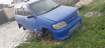 араб 2 бака: Nissan Cube (кузов Z10), правый руль, хэтчбек 5‑дверный. Цвет синий — 2