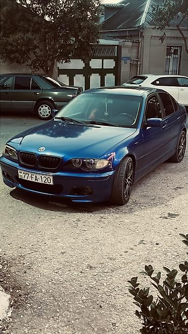 toyota corolla cross: BMW 3 series: 2.5 l | 1999 il Sedan — 2