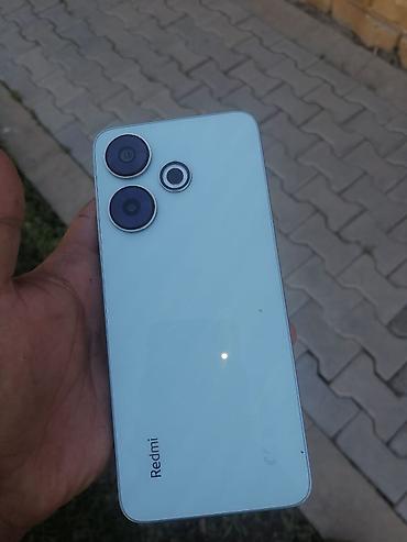 rədmi 13: Redmi smartfon - Rəng: açıq mavi - Arxa panel: parlaq səth, “Redmi” — 1