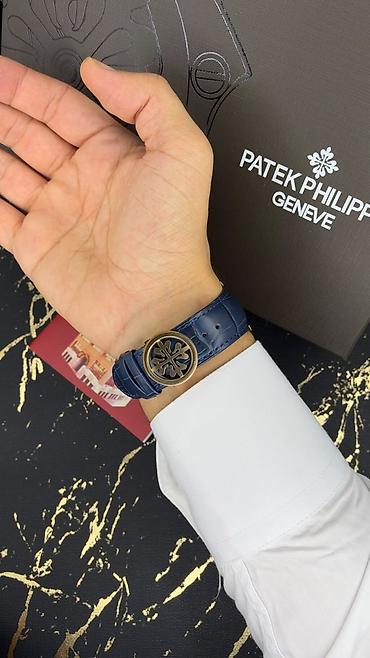 saat samdan: Patek Philippe Geneve kişi qol saatı – mavi günəş şüalı siferblat və — 2