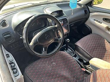 byd e6: Mitsubishi Carisma: 2002 г., 1.6 л, Автомат, Бензин, Седан — 6