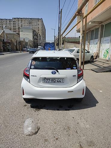 Toyota: Toyota Aqua hibrid hetçbek - Rəng: ağ - Korpus: 5 qapılı hetçbek — 4