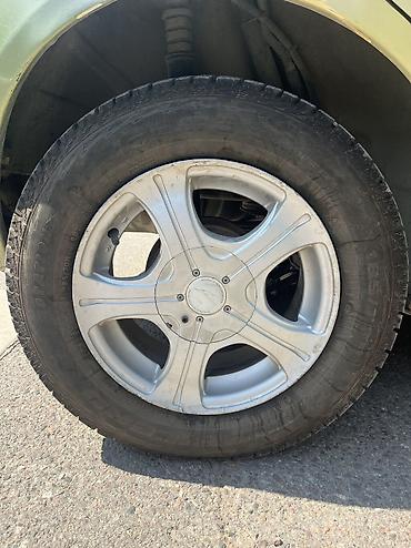 марч: Nissan March: 2004 г., 1.2 л, Автомат, Газ, Хэтчбэк — 10