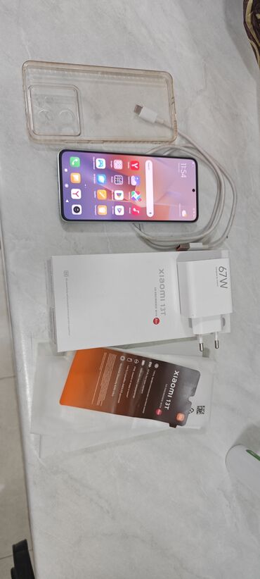 telefon işlənmiş: Xiaomi 13T, 256 ГБ, цвет - Голубой, 
 Гарантия, Отпечаток пальца, Беспроводная зарядка