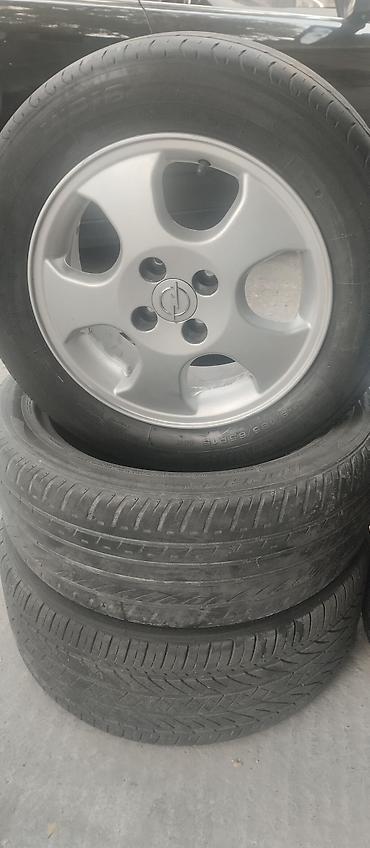3110 maşın: Alüminium disk və şin dəsti - Disk: 5 barmaq, gümüş rəng, mərkəzdə — 1