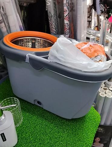 Ведро-швабра с центрифугой (spin-mop) для мытья полов. Особенности: -