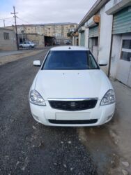 двигатель фольксваген тигуан: Ağ rəngli sedan avtomobil Xüsusiyyətlər: - Kuzov: 4 qapılı sedan, ağ