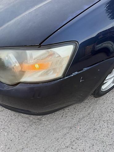 универса: Subaru Legacy: 2004 г., 2 л, Типтроник, Бензин, Универсал — 5