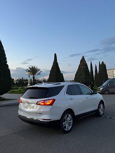 şevralet equinox: Chevrolet Equinox – ağ rəngli, şəhər və uzun yol üçün rahat krossover — 5
