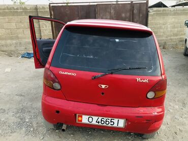 фара опель вектра б: Красный хэтчбек Daewoo Matiz, компактный городской автомобиль