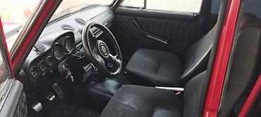 vaz 2107 on şuşə: VAZ 2106, qırmızı rəng, klassik sedan. Xüsusiyyətlər: -Salam maşin — 4