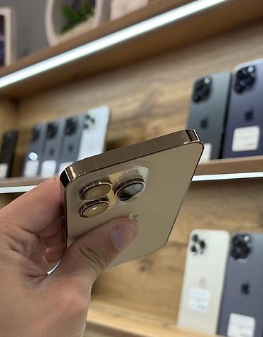 iphone 67: IPhone 14 Pro, 128 GB, Matte Gold, Zəmanət, Simsiz şarj, Face ID — 5