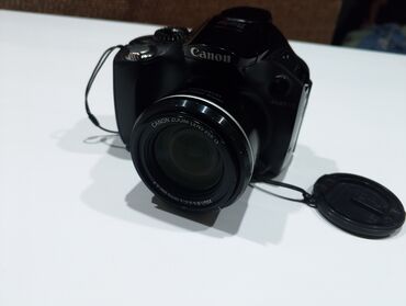 Фотоаппараты: Canon sx40 Hs зум 140х есть встроенная вспышка и микрофон в комлекте