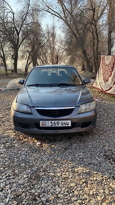 mazda: Mazda 323: 2003 г., 1.5 л, Механика, Бензин, Хэтчбэк — 7