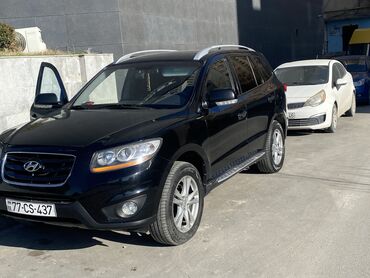 LuAZ: Hyundai Santa Fe – qara rəngli, şəhər və uzun yol üçün tam ölçülü SUV