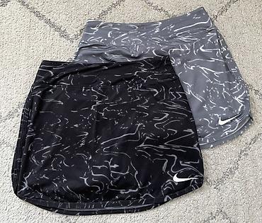 waikiki ženski kompleti: Nike Dri-FIT ženske sportske suknjice (skort) za tenis/padel– set od 2 — 2