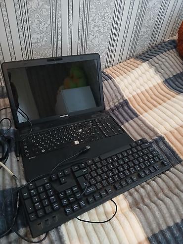 kredit noutbuk: Toshiba noutbuk basi cixan bilir necedi klavyaturasinda birde — 4