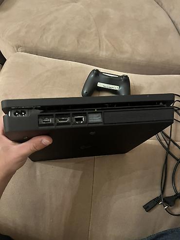 nintendo switch 3 lite: PlayStation 4 Slim (qara) oyun konsolu -13.50 surum Paketə daxildir: - — 2