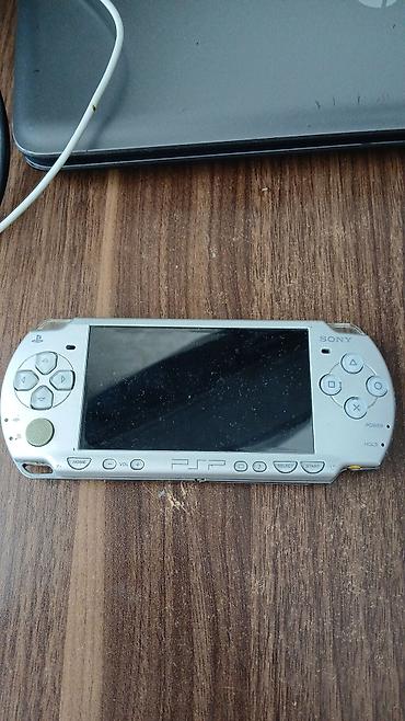 nintendo switch ikinci el: Sony PSP portativ oyun konsolu – gümüş rəng Xüsusiyyətlər: - 4.3 düym — 1
