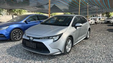 tayota runx: Toyota Corolla: 2019 г., 1.8 л, Вариатор, Гибрид, Седан